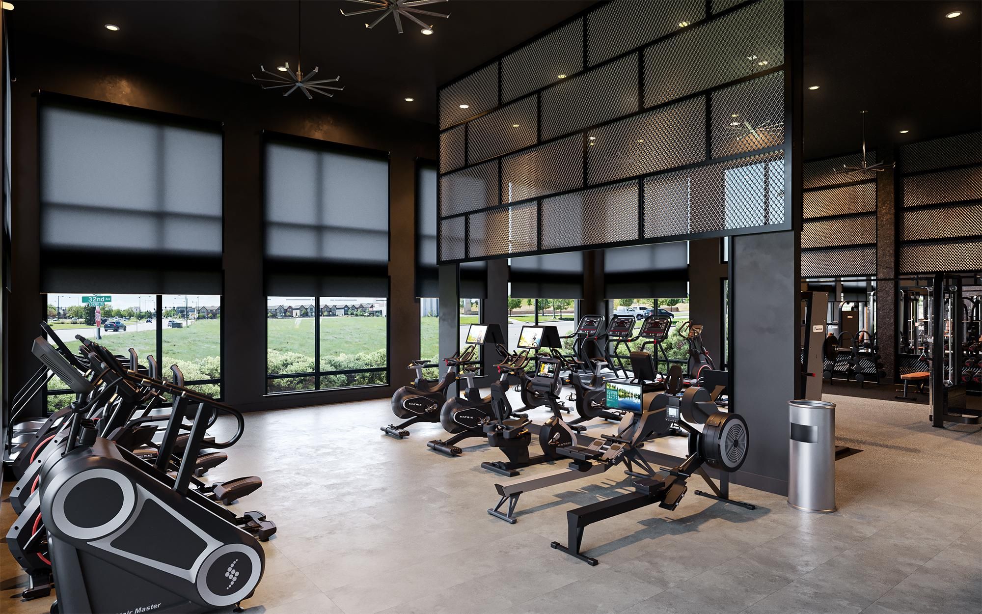 State-of-the-art gym at Solana Central Park featuring cardio machines and weights in a high-ceilinged room.